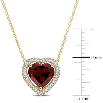3 4/5 CT TGW Garnet and 1/5 CT TW Diamond Halo Heart Necklace in Yellow
Plated Sterling Silver