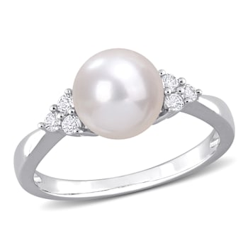 8-8.5MM Freshwater Cultured Pearl and 1/4 CT TGW White Topaz Ring in
Sterling Silver