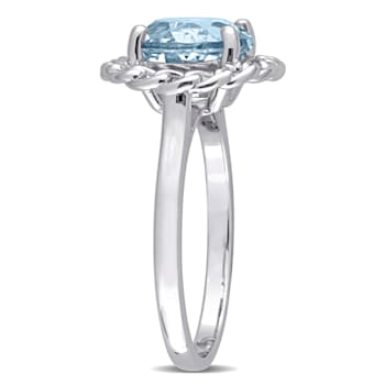 3 1/2 CT TGW Sky Blue Topaz Halo Ring in Sterling Silver