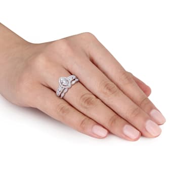 1/5 CT TW Diamond Oval Halo Bridal Ring Set in Sterling Silver