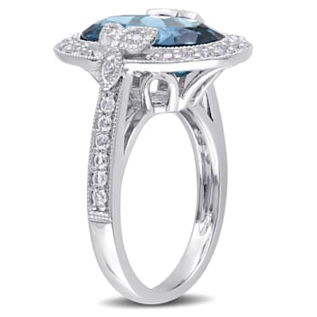 7 7/8 CT TGW London Blue and White Topaz with Diamond Accent Cocktail
Ring in Sterling Silver