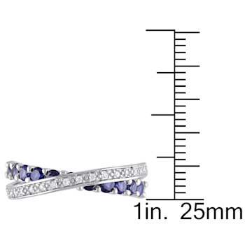 1 CT TGW Created Blue Sapphire and 1/10 CT TW Diamond Crossover Ring in
Sterling Silver