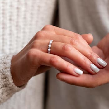 3.5-4MM Freshwater Cultured Pearl and 1/8 CT TGW White Topaz Semi
Eternity Ring in Sterling Silver