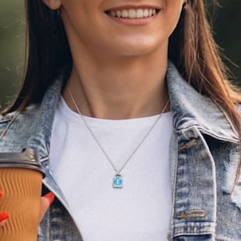 7 3/4 CT TGW Sky Blue Topaz and Black Sapphire Pendant with Chain in
Sterling Silver