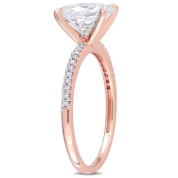 2 CT DEW Created Moissanite and 1/10 CT TW Diamond Engagement Ring in
14K Rose Gold