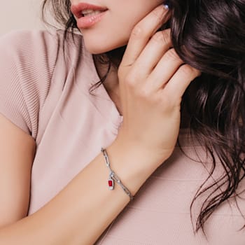 1 2/5 CT TGW Created Ruby and Created White Sapphire Bracelet in
Sterling Silver