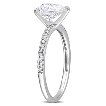 1-1/4 CT DEW Created Moissanite and 1/10 CT TW Diamond Engagement Ring
in 14K White Gold