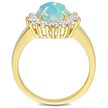 2 1/6 CT TGW Blue Ethiopian Opal, White Topaz and Diamond Ring in Yellow
Plated Sterling Silver
