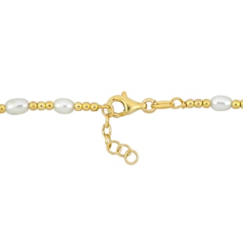 3.5-5MM Freshwater Cultured Pearl Station Bead Bracelet in Yellow Plated
Sterling Silver