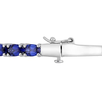 8-1/4 CT TGW Oval-Cut Created Blue Sapphire Bangle in Sterling Silver