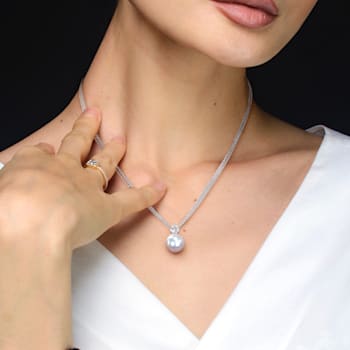 11-12MM Freshwater Cultured Pearl and 5/8 CT TGW White Topaz Pendant in
Sterling Silver