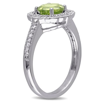 1 1/2 CTW Peridot and 1/8 CT TW Diamond Halo Ring in Sterling Silver