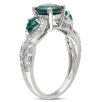 1 5/8 CTW Created Emerald and 1/6 CT TW Diamond 3-Stone Infinity Ring in
Sterling Silver