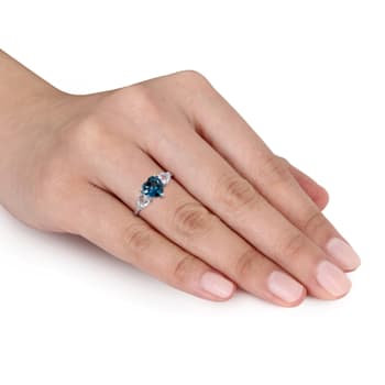 2 1/5 CT TGW London Blue and Sky Blue Topaz and Diamond Accent Ring in
Sterling Silver