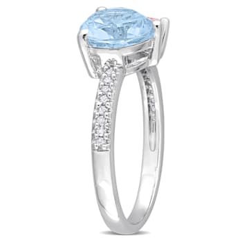 2 5/8 CT TGW Sky Blue Topaz and Morganite with 1/10 CT TW Diamond Toi et
Moi Ring in Sterling Silver