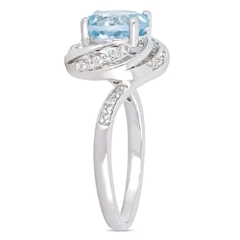 2 1/2 CT TGW Sky Blue and White Topaz with Diamond Accent Swirl Ring in
Sterling Silver