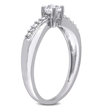 1/3 CT TGW Created White Sapphire and Diamond  Accent Crossover Ring in
Sterling Silver