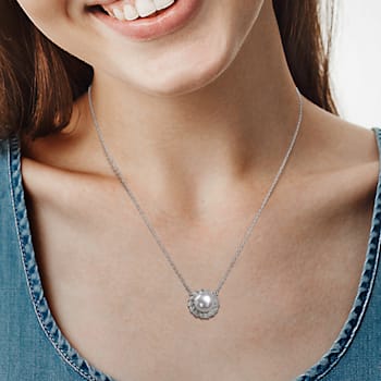 9.5-10MM  Freshwater Cultured Pearl and 1/6 CT TGW Created Sapphire
Pendant in Sterling Silver