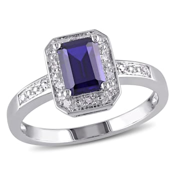 1 1/2 CT TGW Created Blue Sapphire and Diamond Accent Halo Ring in
Sterling Silver
