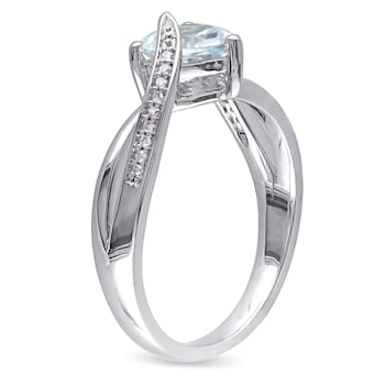 1 1/2 CT TGW Aquamarine and Diamond Accent Heart Crossover Ring in
Sterling Silver