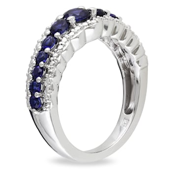 1 1/6 CT TGW Created Blue Sapphire Graduated Ring in Sterling Silver