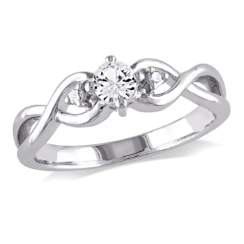 1/3 CT TGW Created White Sapphire and Diamond Accent Infinity Ring in
Sterling Silver