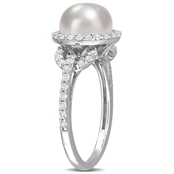 8.5-9MM Freshwater Cultured Pearl and 3/4 CT TGW White Topaz Halo Ring
in Sterling Silver