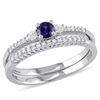 1/3 CTW Created Blue and Created White Sapphire with Diamond Accent Ring
Set in Sterling Silver