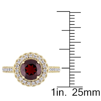 1 5/8 CTW Garnet and 1/8 CT TW Diamond Halo Ring in Yellow Plated
Sterling Silver