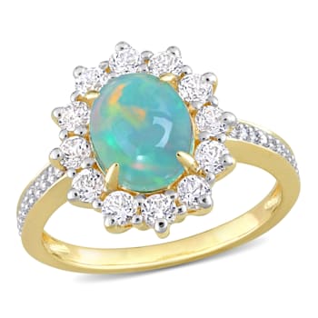 2 1/6 CT TGW Blue Ethiopian Opal, White Topaz and Diamond Ring in Yellow
Plated Sterling Silver