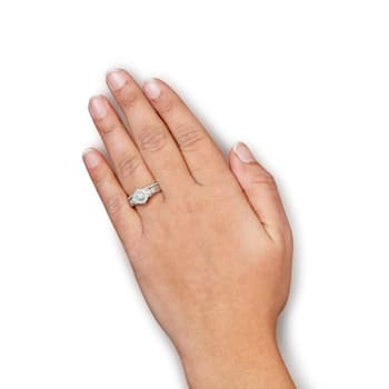 Sterling Silver 1/3ctw Diamond 7 Stone Cluster and Halo Engagement and
Wedding Band Set