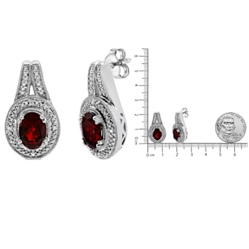 Sterling Silver Diamond Accent and 8x6mm Red Oval Garnet Stud Earrings