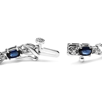 10K White Gold Oval Sapphire Gemstone and 1/10ctw Diamond Prong Set
"X" Link Bracelet - Size 7"