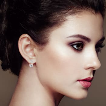 10K Two-tone Gold 1/3 Cttw Diamond Infinite and Ribbon Hoop Earrings
(H-I Color, I1-I2 Clarity)