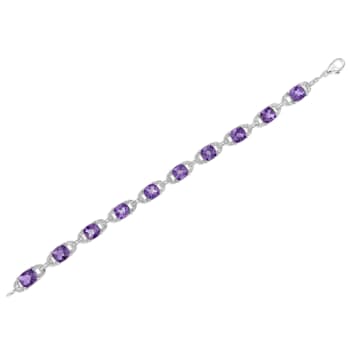 .925 Sterling Silver 7x7 mm Cushion Cut Amethyst and 1/20ctw Round Cut
Diamond Tennis Bracelet