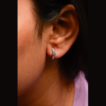 10K White Gold Pear Shaped Blue Sapphire and 1/10 Cttw Diamond Huggy
Hoop Earrings