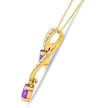 14K Yellow Gold 6x4mm Oval Pink Sapphire and 1/5ctw Round Diamond
Pendant w\chain
