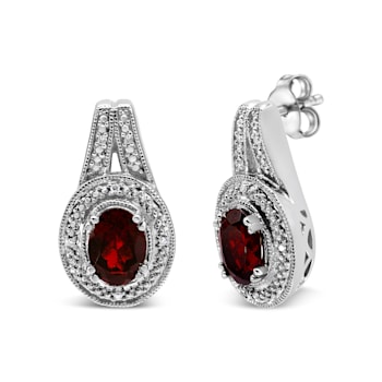 Sterling Silver Diamond Accent and 8x6mm Red Oval Garnet Stud Earrings