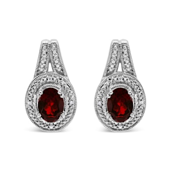 Sterling Silver Diamond Accent and 8x6mm Red Oval Garnet Stud Earrings