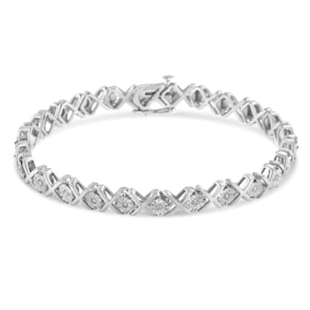 Sterling Silver 1/10 cttw Diamond "X" Link Tennis Bracelet
(I-J, I2-I3) - 7.25"