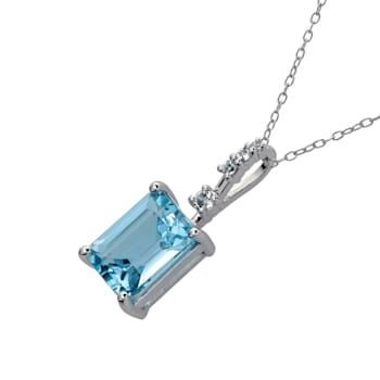 10k White Gold Genuine Emerald Cut Blue Topaz and White Topaz Pendant
With Chain