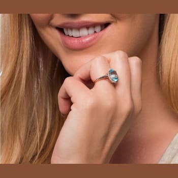10k White Gold 3.50ct Oval Blue Topaz and Diamond Halo Ring