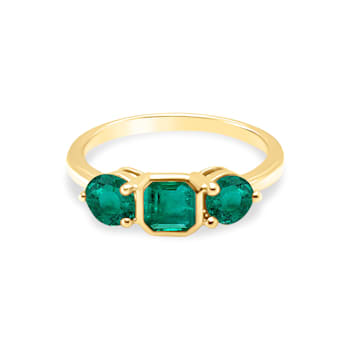 1.29Cts Colombian Emerald, crafted in 18K yellow gold 3-Stone Ring.