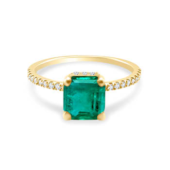 1.52Cts, Colombian Emerald, 0.33cw diamond, crafted in 18K Yellow gold,
center design ring.