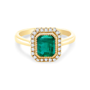1.06Cts Colombian Emerald, 0.14cw diamond, crafted in 18K Yellow gold ring.