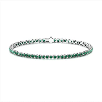 Lady's Emerald Tennis Bracelet, 2.82 cts round shape emeralds stones,
crafted in 18K Gold.