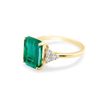 3.67 Colombian emerald-emerald cut, 0.27 diamond, Crafted in 18K yellow
gold, center design ring.