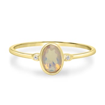 GEMistry 0.32 ctw Oval Ethiopian Opal and Topaz Midi Ring in 925
Sterling Silver