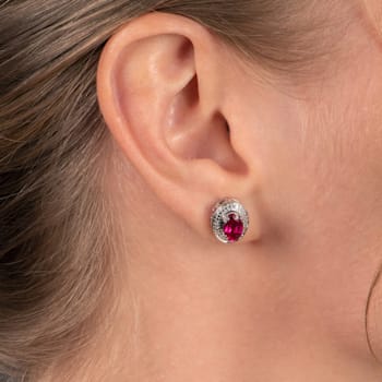Sterling Silver 7x5 MM Oval Ruby and Natural White Round Diamond Stud Earrings