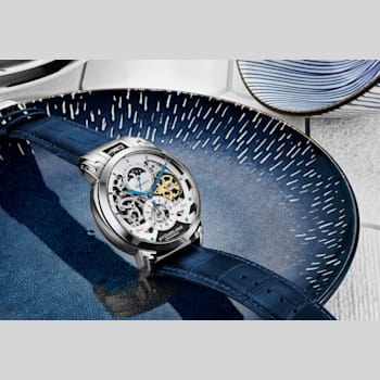 Men's Automatic Watch Dual Time Silver Skeleton Dial With Gold Tone
Accents, Blue Leather Strap